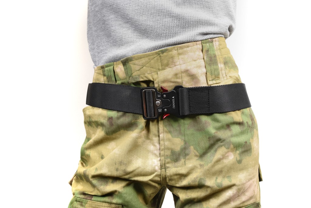 Insert belt with safety clasp