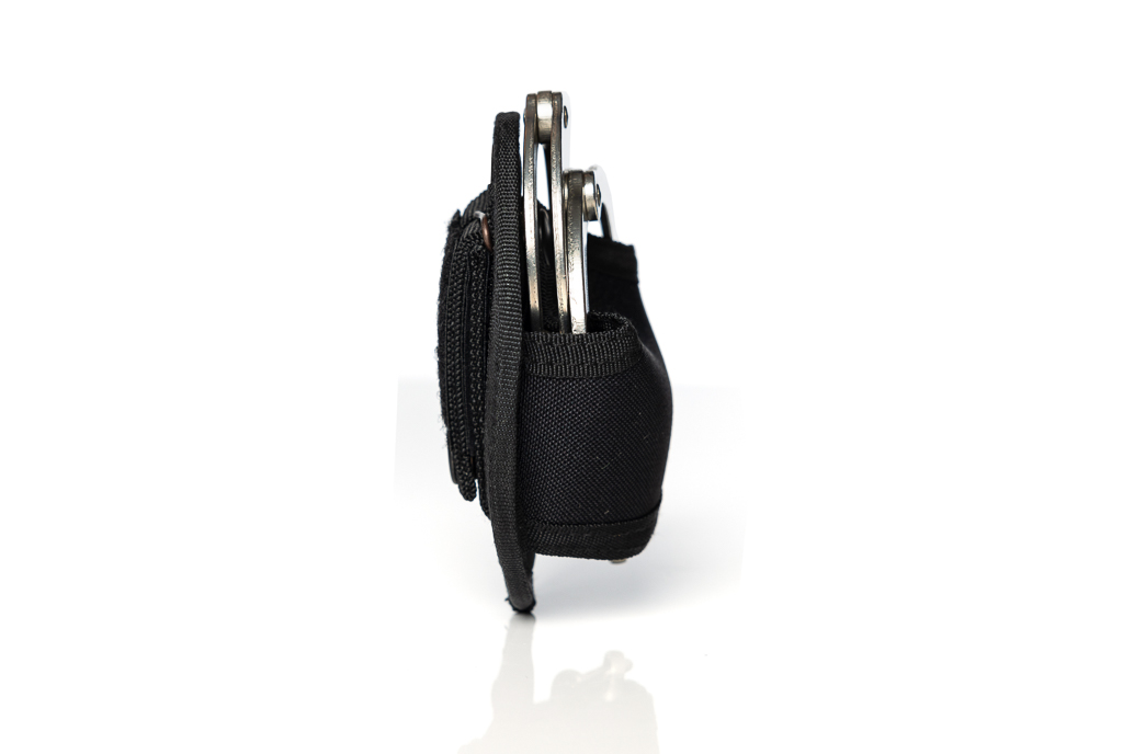 Handcuff holster with press snap fastener
