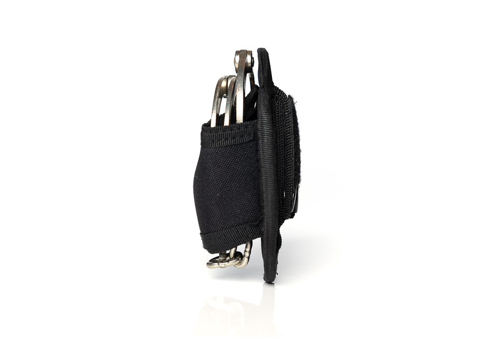 Handcuff holster with press snap fastener