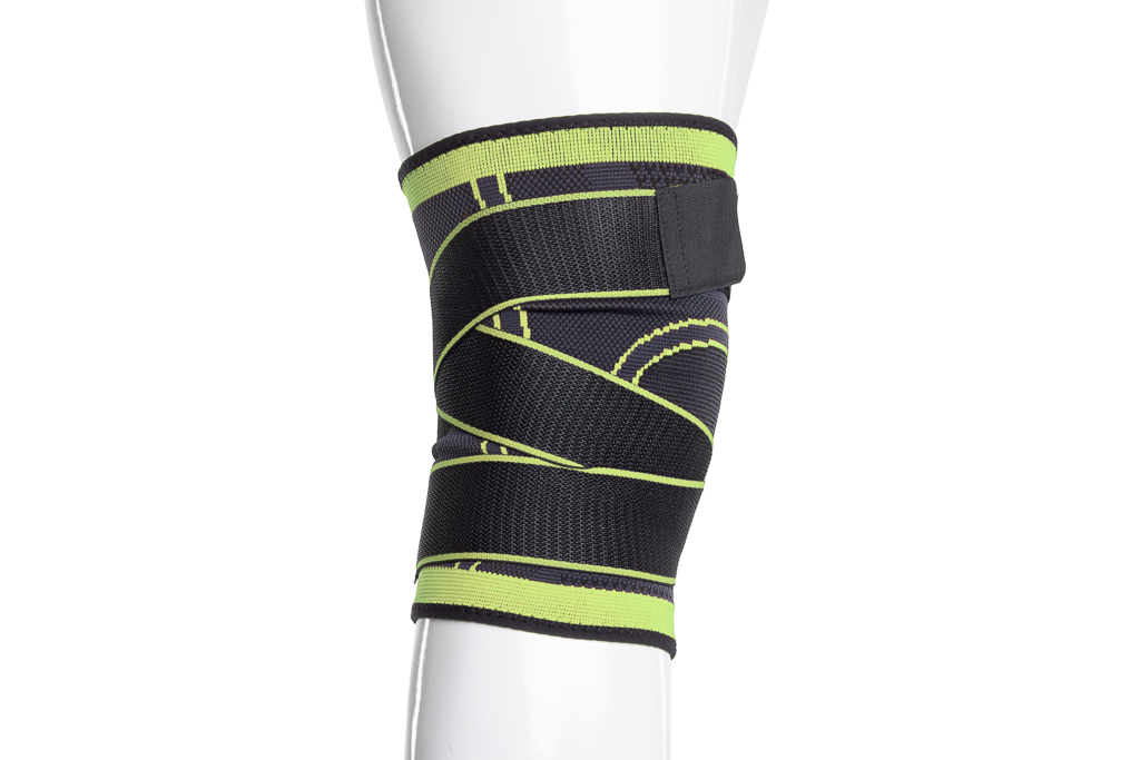 Bandage de genou de soutien avec une large fermeture velcro de 5 cm - vert-noir