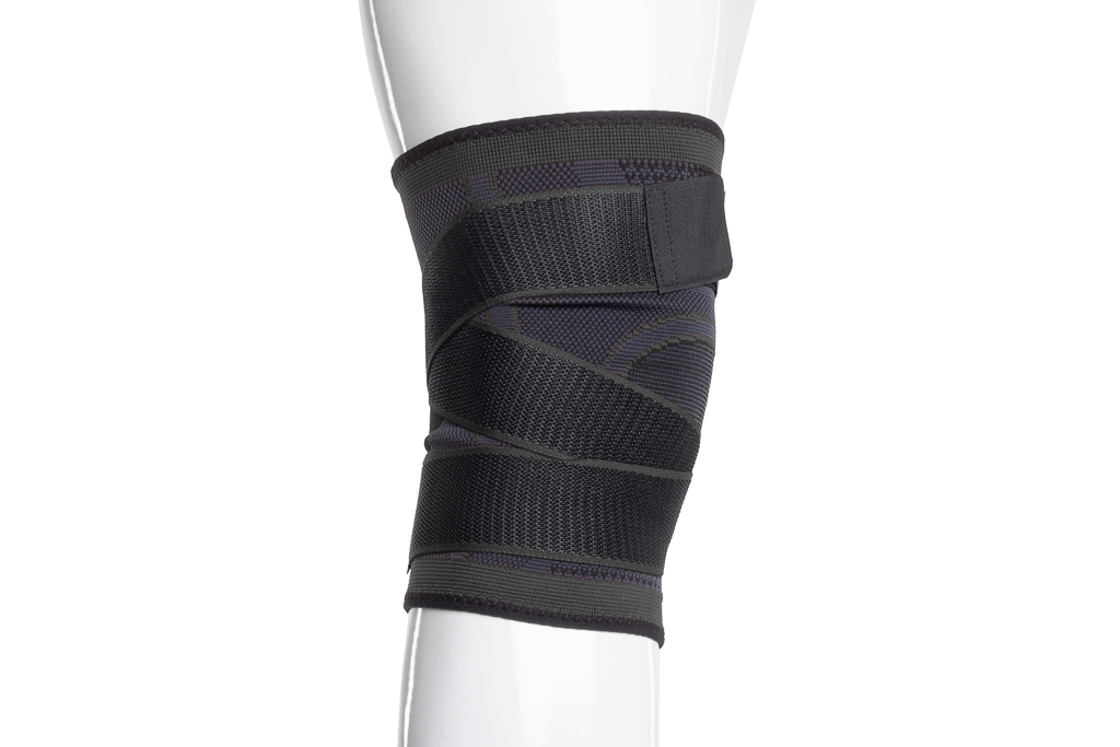 Bandage de genou de soutien avec une large fermeture velcro de 5 cm - noir