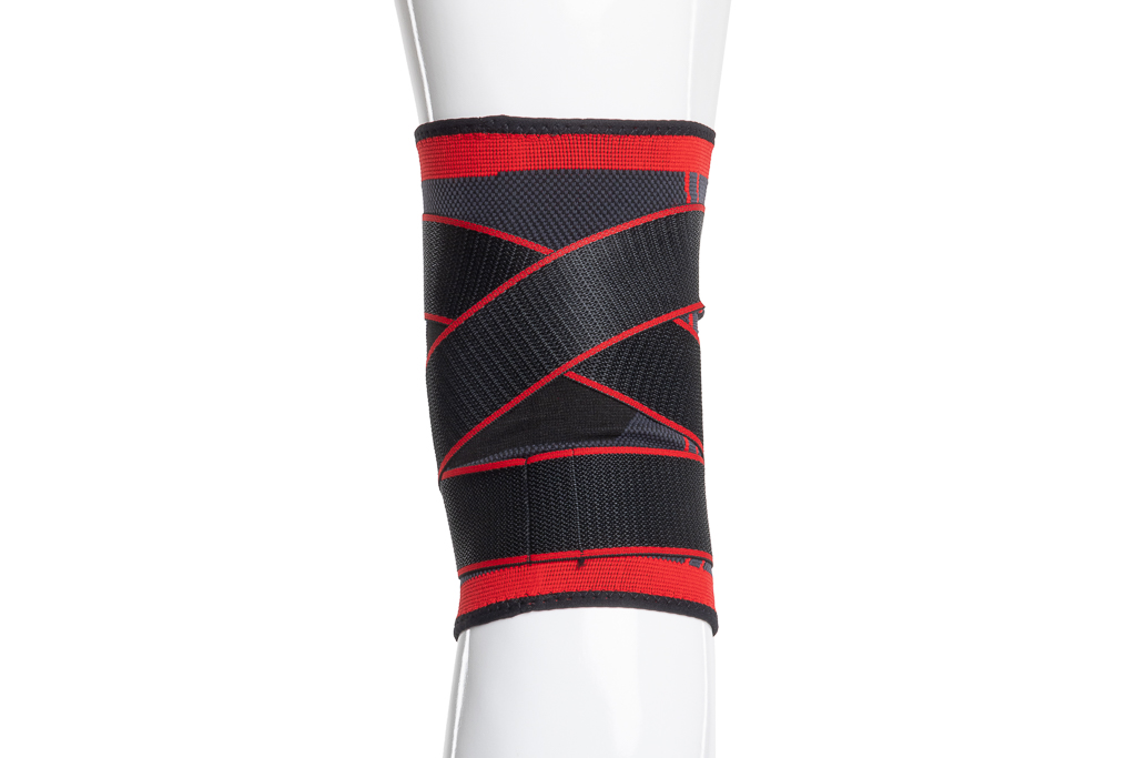 Bandage de genou de soutien avec une large fermeture velcro de 5 cm - rouge-noir